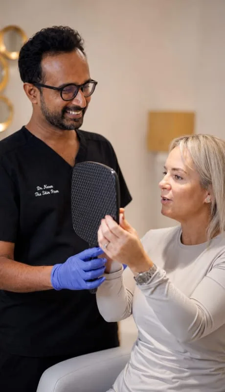 Facial treatment in progress at The Skin Firm